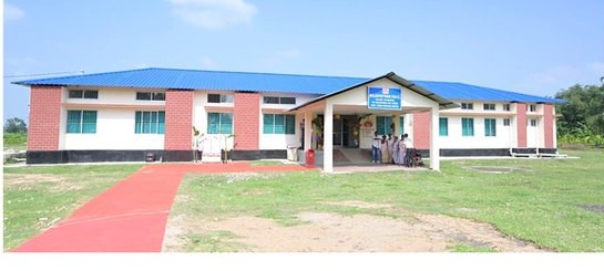 Healthcare facility building shown in the progress booklet